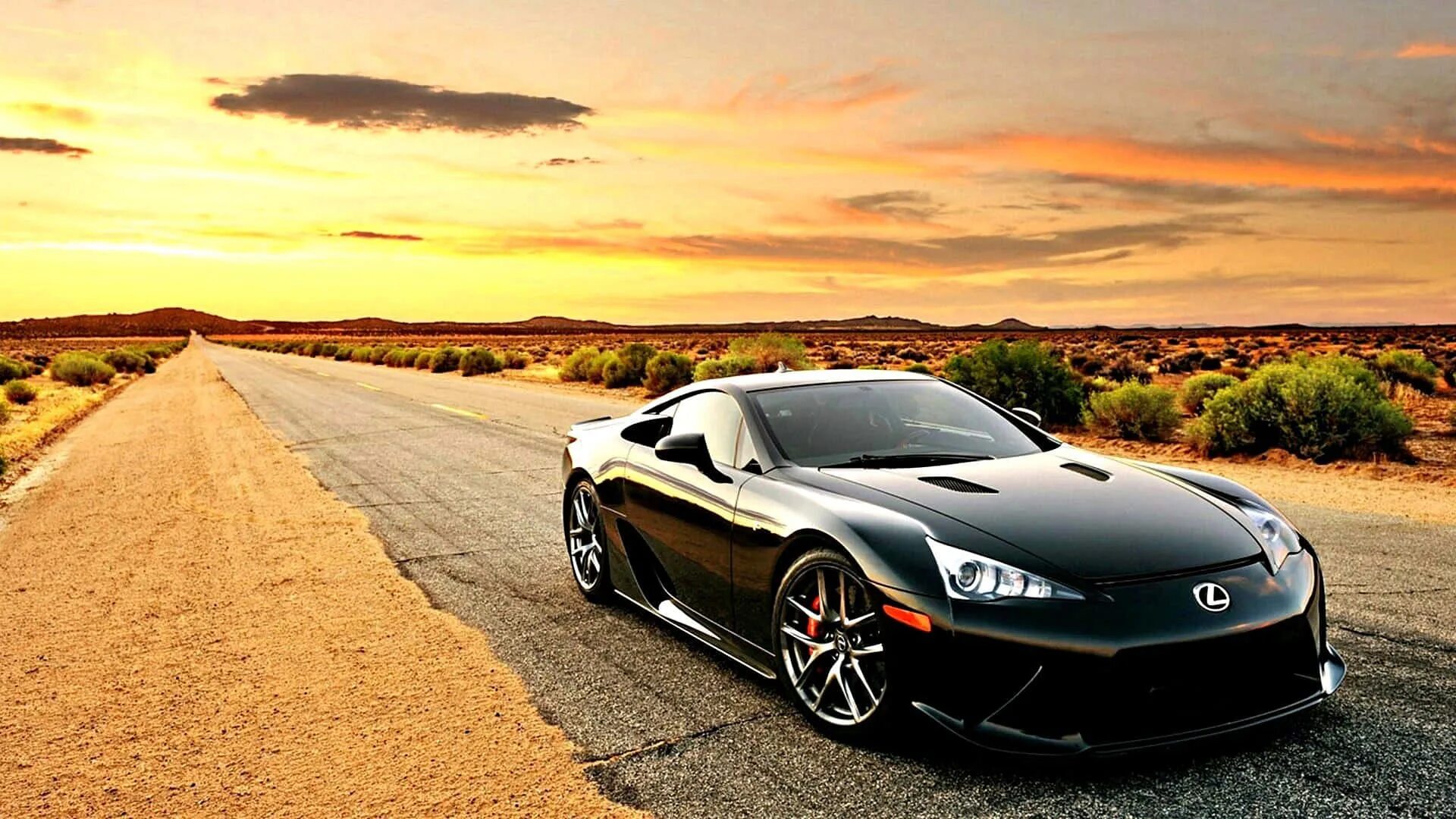 Качественное фото автомобилей Download Striking Lexus LFA Supercar on the Road Wallpaper Wallpapers.com