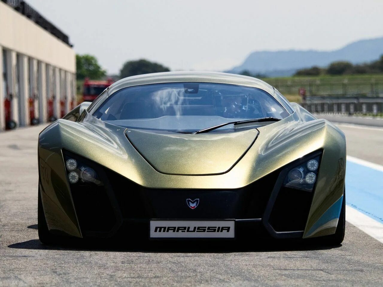 Кар авто фото Marussia B2 2010 - 2014 Купе: кузов, класс, тип и объём двигателя, коробка перед