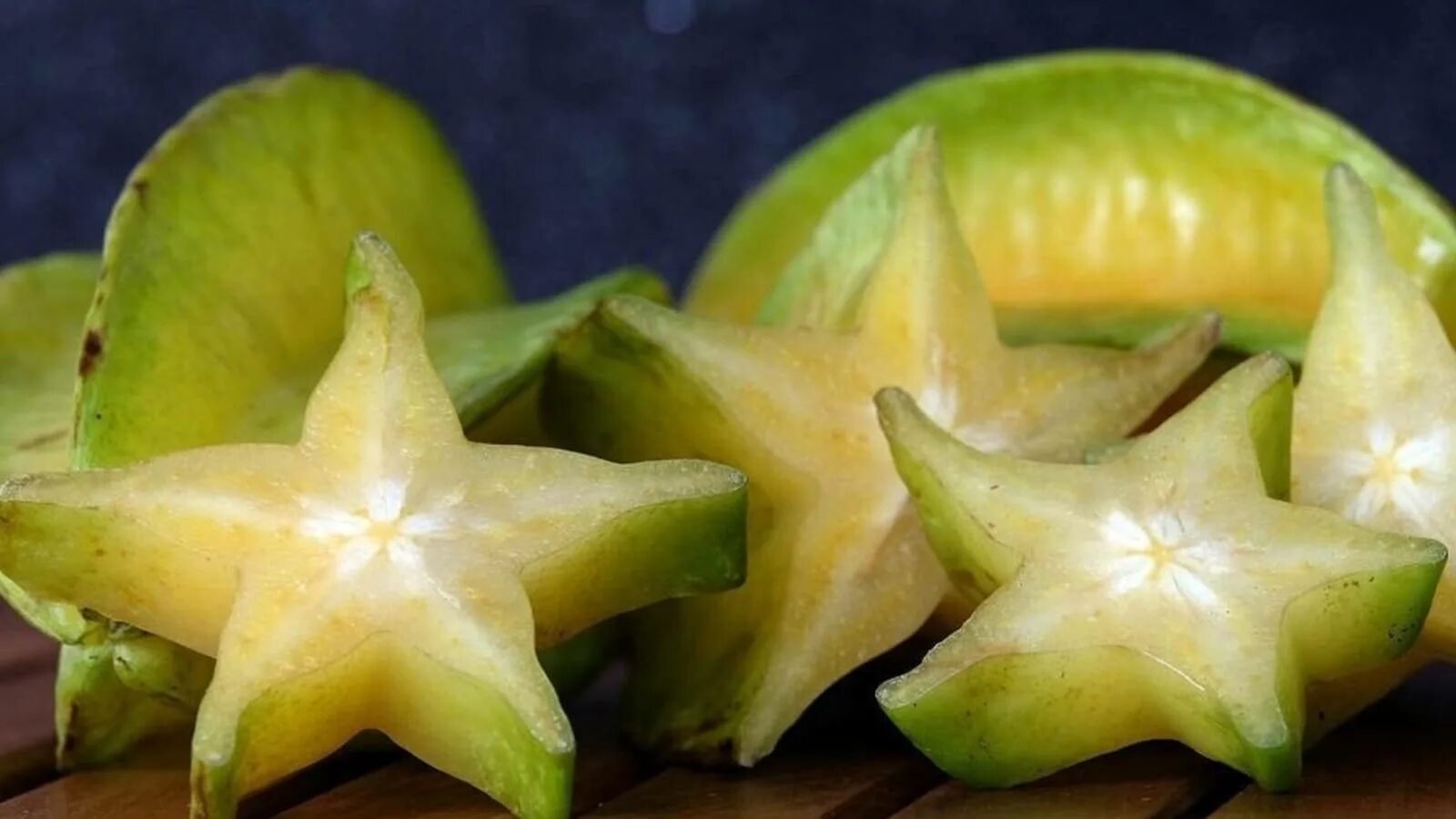 Карамболь фрукт фото Download Star Fruits On The Wooden Table Wallpaper Wallpapers.com