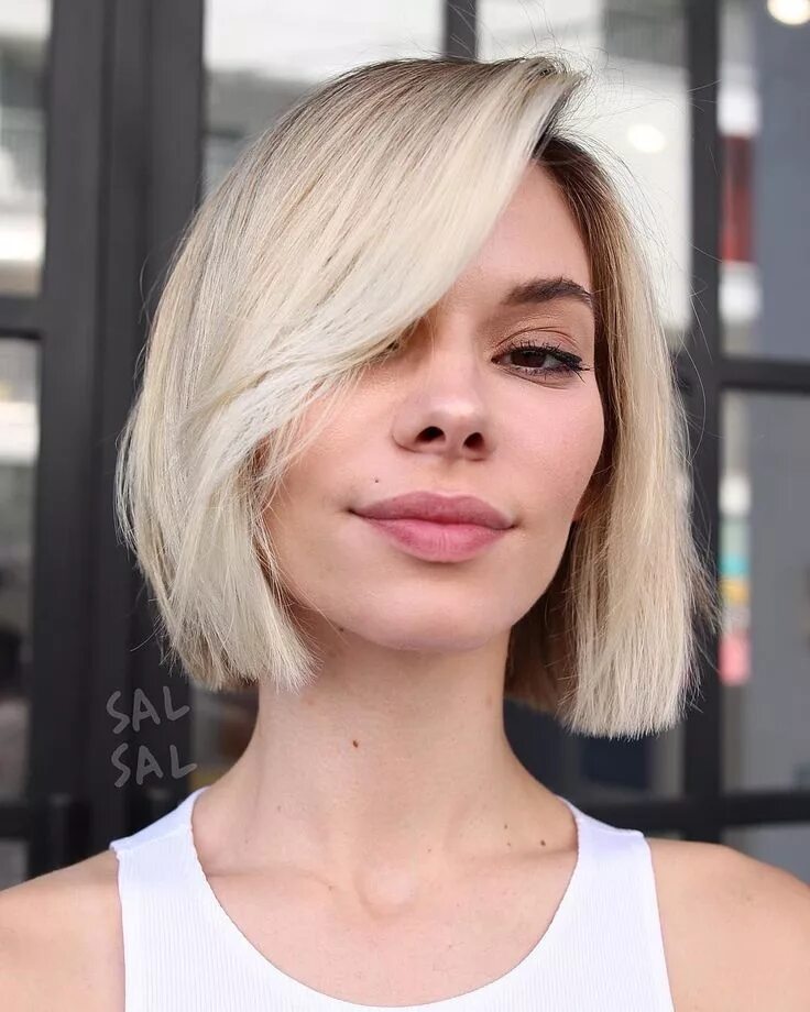 Каре девиль фото Sharp, Chin Length Bob----Hair with medium thickness looks excellent cut into a 