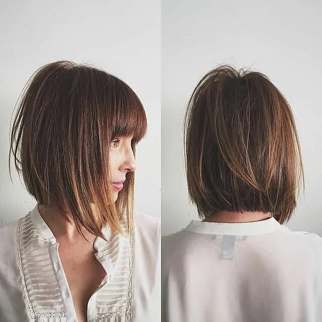 Каре слоями фото Chic Razor Cut Bob with Bangs and Undone Straight Texture with Warm Brown Color 