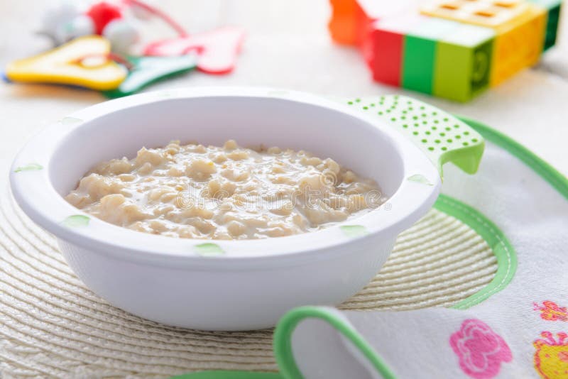 Каши в детском саду фото Oatmeal Porridge for Children Nutrition on White Tablecloth Stock Photo - Image 