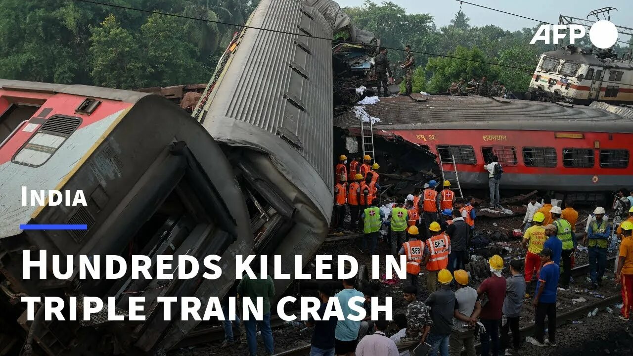 Катастрофы поездов фото Wreckage piled high after India triple train crash AFP - YouTube