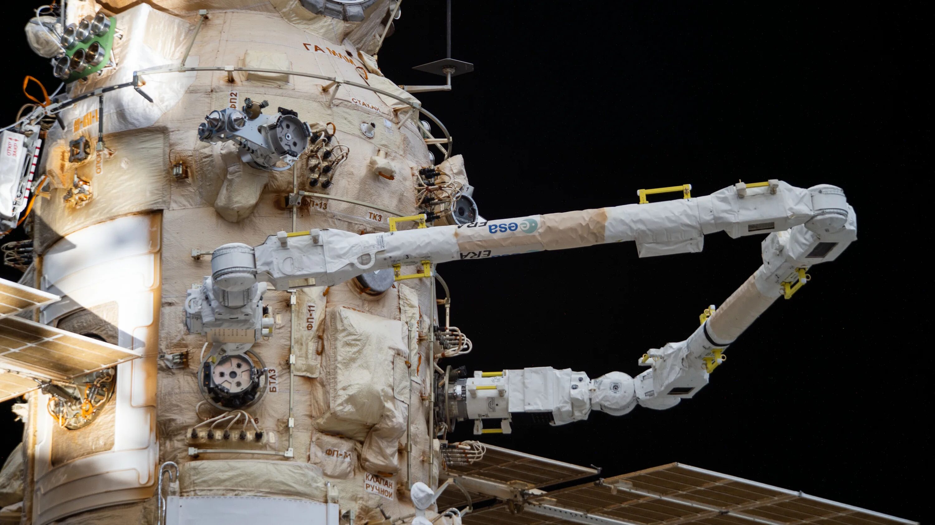 Кб мкс тула фото Файл:The European robotic arm extends out from the Nauka module (iss067e034864).