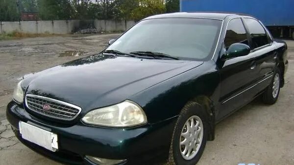 Киа кларус фото KIA Clarus 2.0 бензиновый 2000 2.0 GLX ручка на DRIVE2