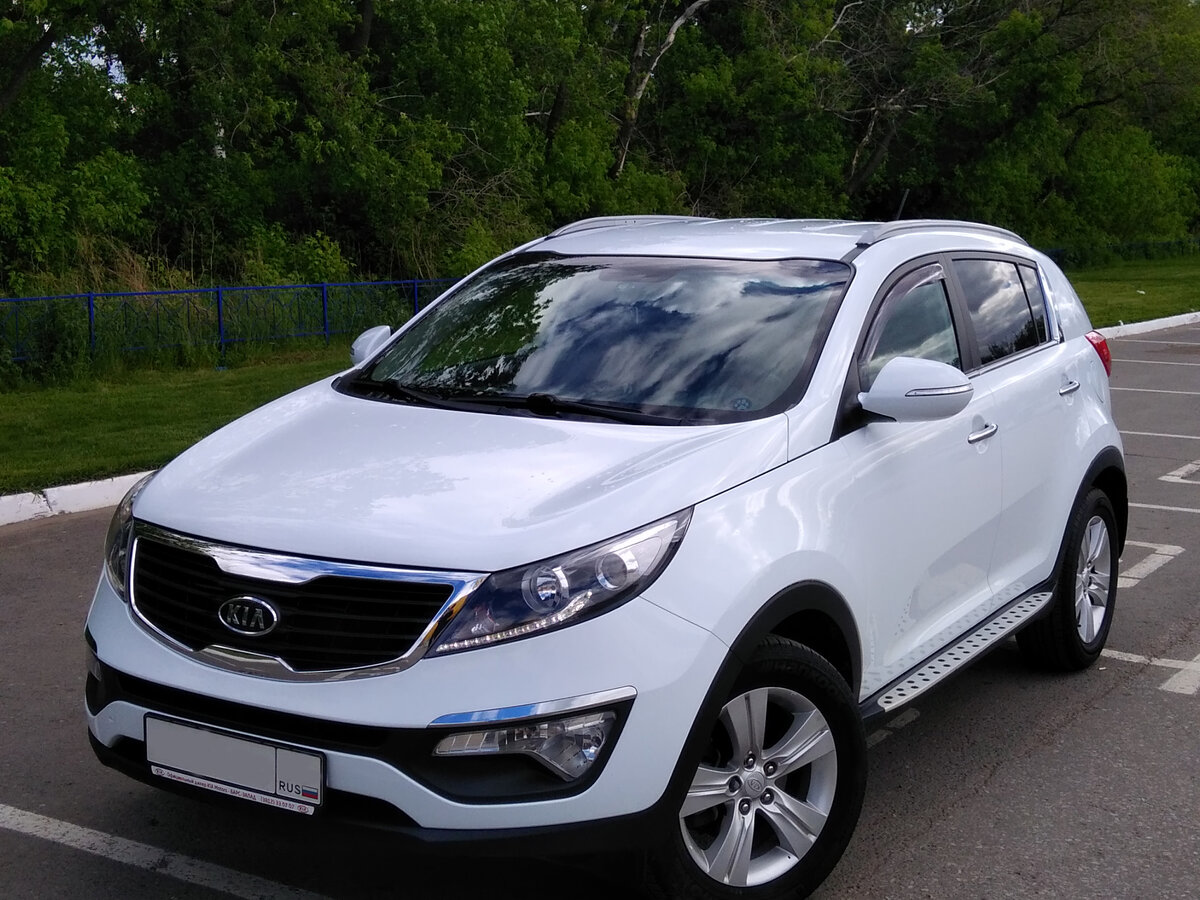 Киа купить бу фото Купить б/у Kia Sportage III 2.0 AT (150 л.с.) бензин автомат в Омске: белый Киа 