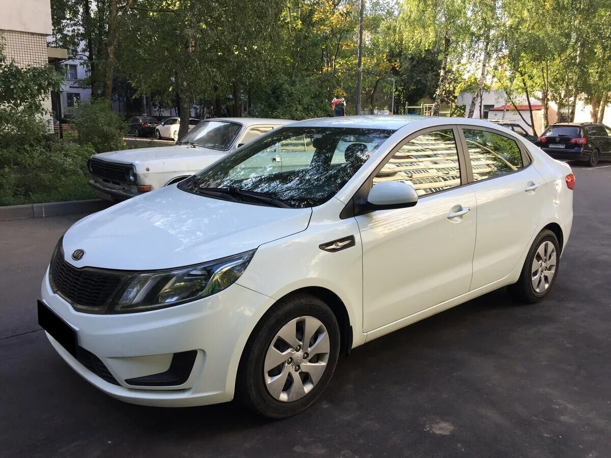 Киа рио 12 года фото Купить б/у Kia Rio III 1.4 MT (107 л.с.) бензин механика в Москве: белый Киа Рио