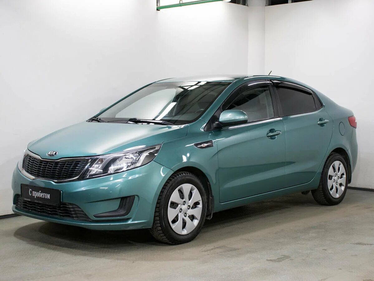 Киа рио москва цена фото Купить б/у Kia Rio III 1.4 MT (107 л.с.) бензин механика в Москве: зелёный Киа Р