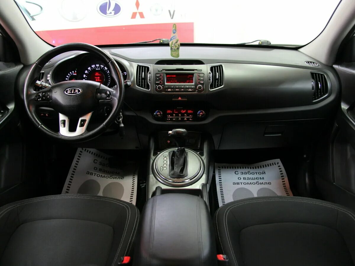 Киа спортейдж салон внутри фото Купить б/у Kia Sportage III 2.0 AT (150 л.с.) бензин автомат в Москве: белый Киа