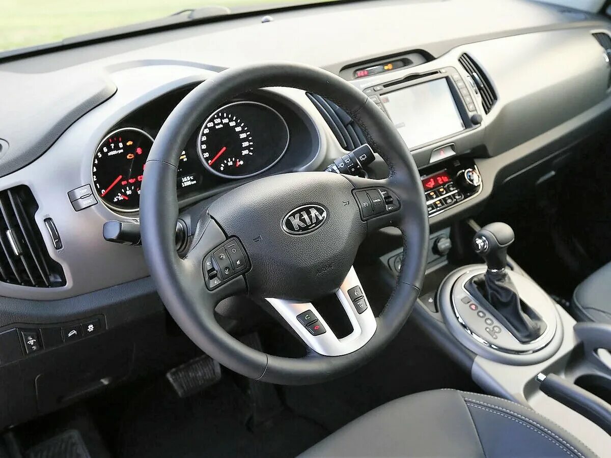 Киа спортейдж салон внутри фото Купить б/у Kia Sportage III 2.0 AT (150 л.с.) 4WD бензин автомат в Пятигорске: б