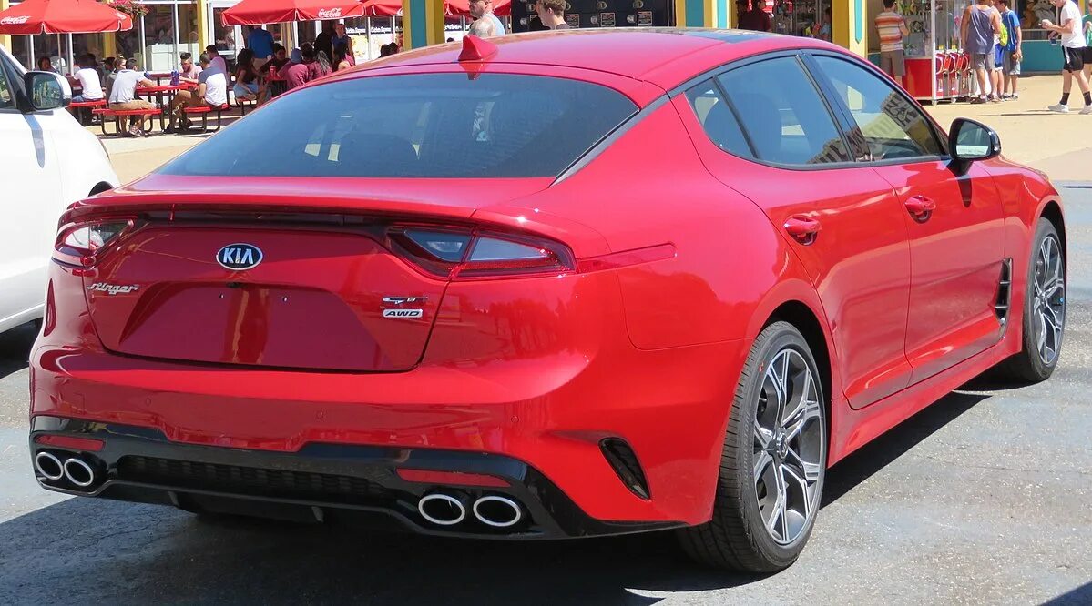 Киа стингер 2024 фото Файл:2018 Kia Stinger GT2 3.3L AWD in Hichroma red rear 5.23.18.jpg - Википедия