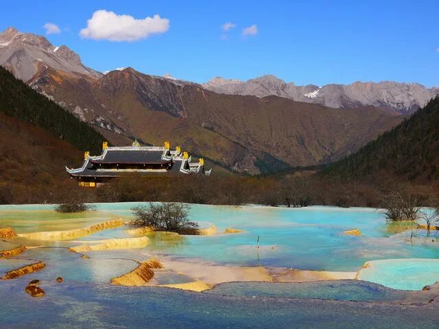 Китай заповедник желтый дракон фото и описание Huanglong, northwest Sichuan, China, known for some colorful pools formed by cal