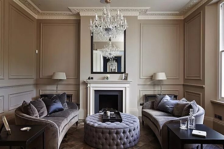 Классический стиль фото Gray and purple living room with trim moldings on taupe walls as well as ornate 