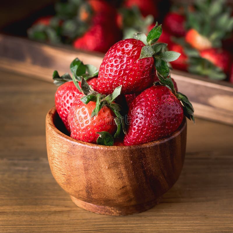 Клубника фото ягода на столе лежит Fresh Tasty Strawberries in Wooden Bowl Wooden Rustic Background Square Stock Ph