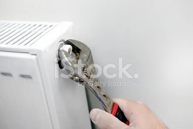 Ключ для спуска воздуха из батарей фото Foto De Stock Mejoras Para El Hogar Libre De Derechos FreeImages