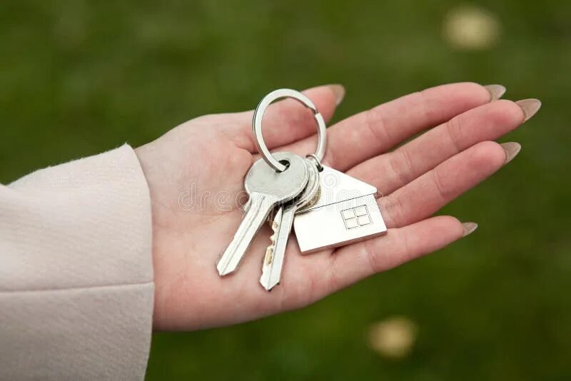 Ключи от новостройки фото Handing the Keys To New Housing Stock Image - Image of owner, investments: 10111