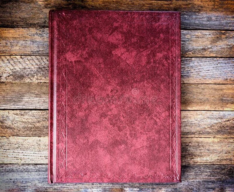 Книга фото сверху The Book is Red on the Old Wooden Boards Close Up, Top View Stock Image - Image 