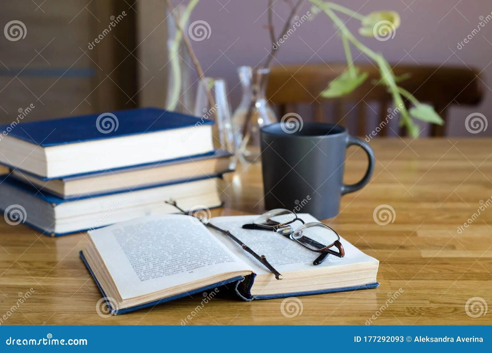 Книги на столе фото Desktop with an Open Book, Stacks of Books, a Cup of Coffee Stock Image - Image 