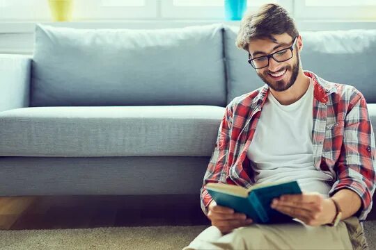 Книги стоковое фото Man Reading A Book Изображения: просматривайте стоковые фотографии, векторные из