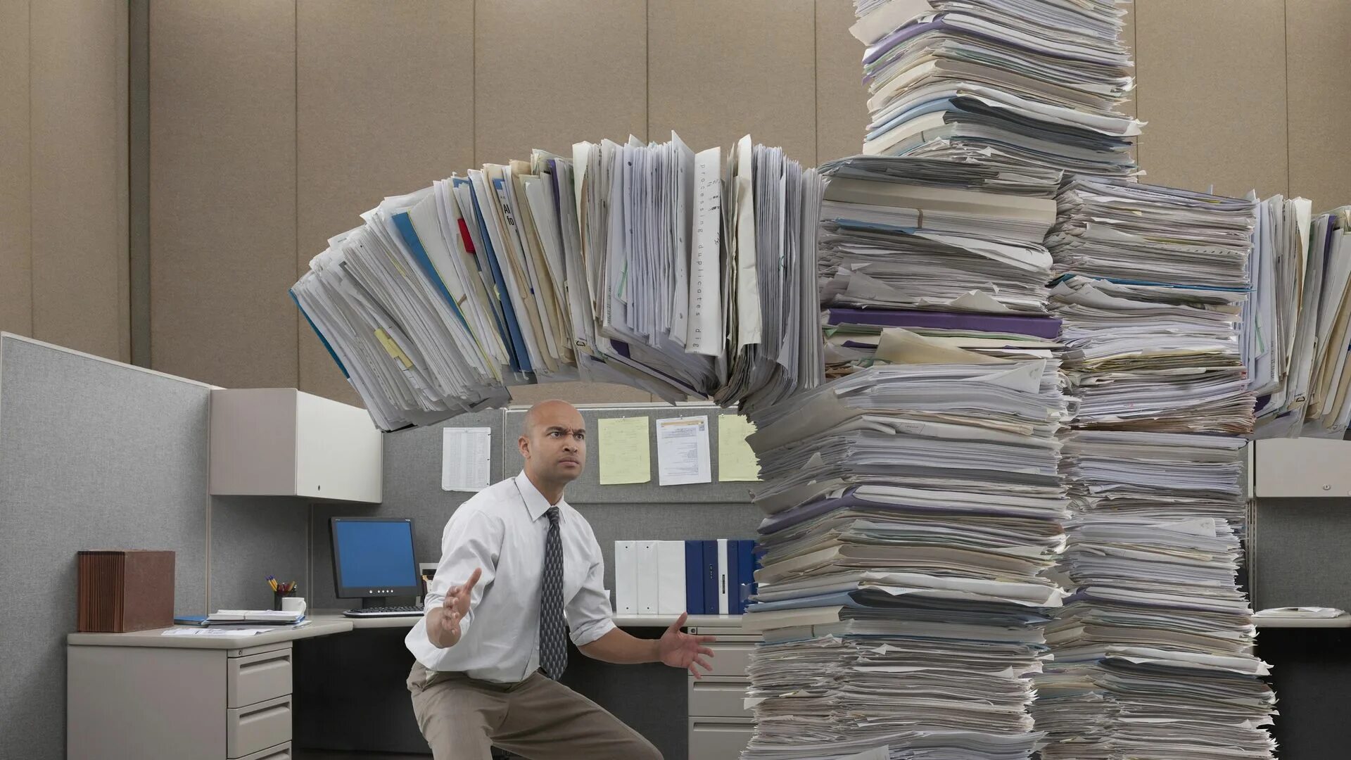 Куча бумаг на столе фото Does Financial Fear Have You Spooked? Don’t Cower - Fight