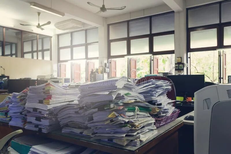 Куча бумаг на столе фото Concept of Document Workload, Pile of Unfinished Documents on Office Desk, Stack