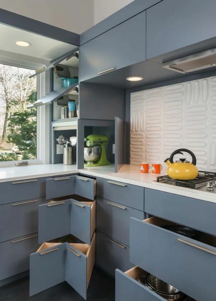 Кухня решения фото Mid-century modern remodel in Massachusetts opens to the outdoors Kitchen cabine