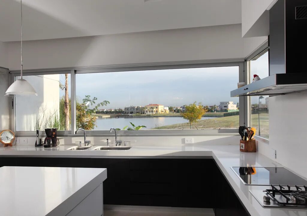 Кухня с большими окнами фото Idea 824601: Cabos House by REMY arquitectos in Tigre, Argentina - Architizer