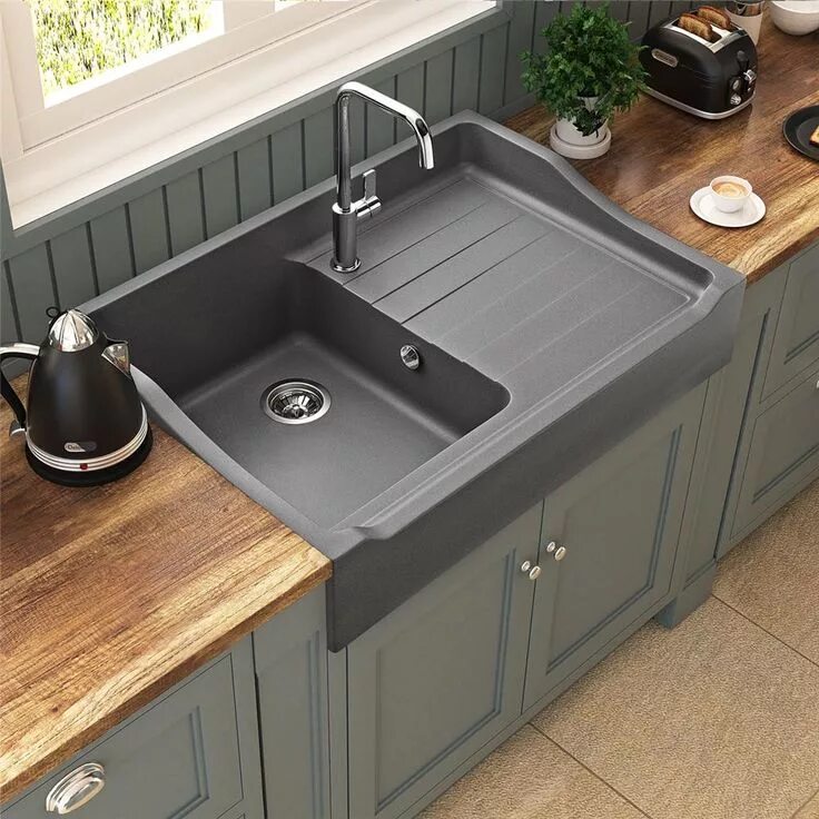 Кухня с маленькой мойкой фото Évier Timbre d`Office 1 bac 1 égouttoir à poser Kümbad KIWI en Granit Gris pour 