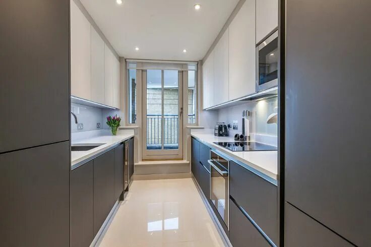 Кухня с параллельной планировкой маленькая Docklands Apartment - Contemporary - Kitchen - London - by Culina Small galley k