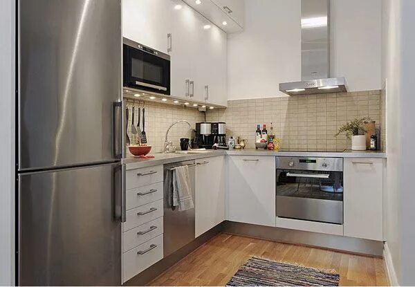Кухня с серым холодильником фото Small kitchen (like mine!). Love the wood floors, white cabinets and stainless a
