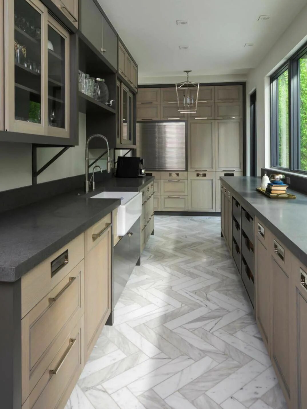 Кухня с серым полом в интерьере Modern residence in Utah showcases exquisite design features