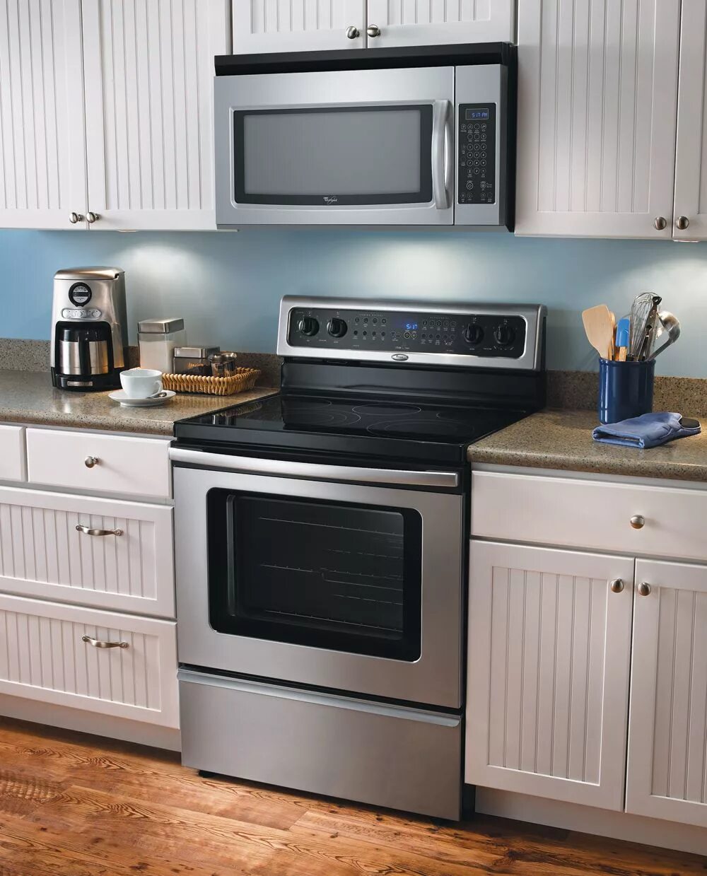 Кухня с встроенной плитой фото 1.6 Cu. Ft. Whirpool Over-the-Range Microwave / Range Hood Combination - Stainle