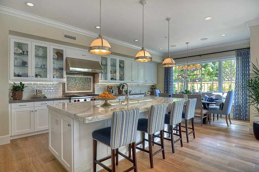 Кухня с выходом на террасу фото Zillow Learning Center Kitchen island with seating, Modern kitchen design, Kitch