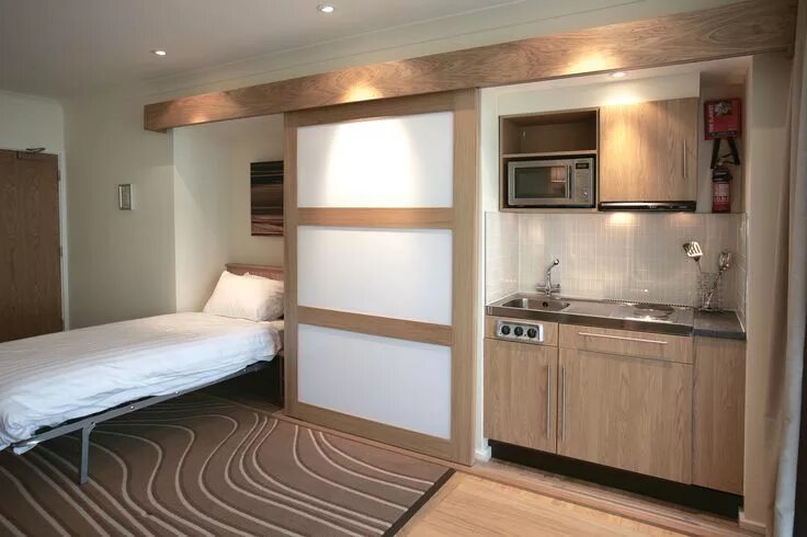 Кухня со спальней фото John Strand MK gallery Tiny apartments, Small kitchen layouts, Small apartments
