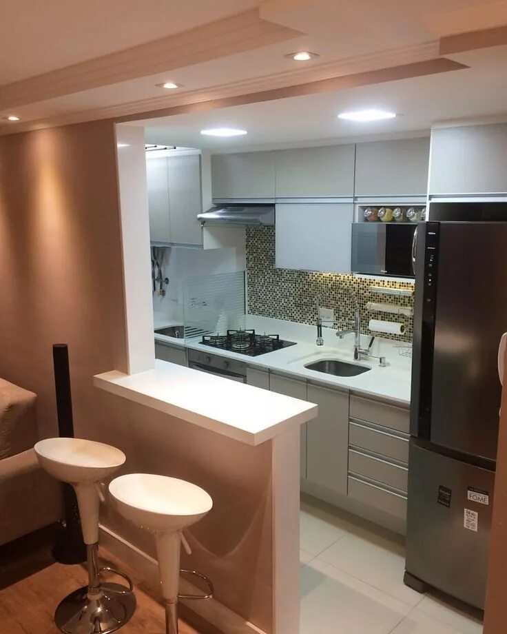 Кухня совмещенная фото Барная стойка и в то же время перегородка, часто встречающаяся компоновка при со