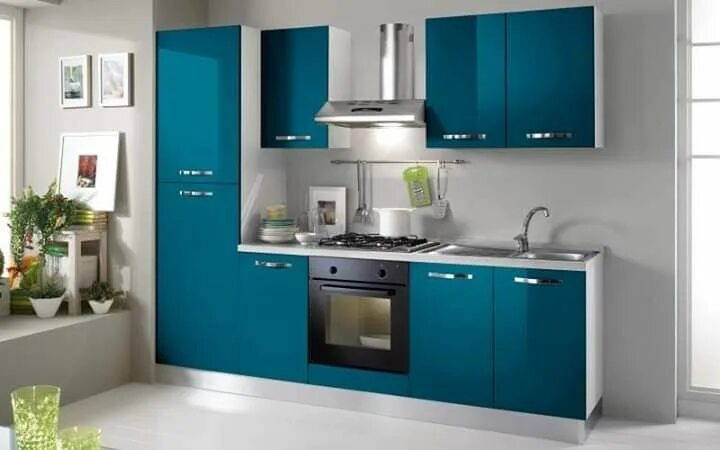 Кухня цвет морской волны фото Stylish Small Kitchen with Blue Cabinets and White Flooring