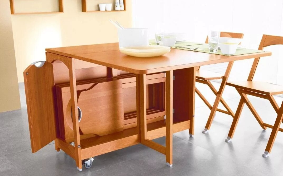 Кухонные столы трансформеры для кухни фото Olivia gateleg table with chair storage, folds down to console. Danish modern in