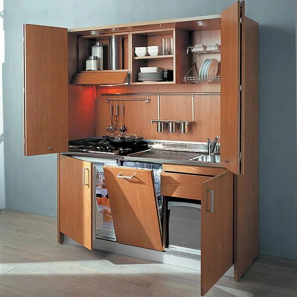 Кухонные трансформеры для маленькой кухни фото full kitchen tucked away in a cabinet Small apartment kitchen, Kitchen design sm