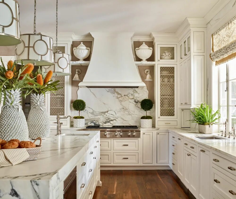 Кухонный декор фото Custom white kitchen with waterfall Calacatta Borghini marble slabs and curving,