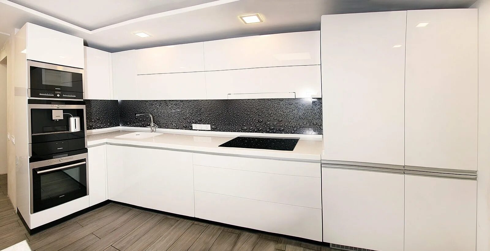 Кухонный гарнитур в стиле минимализм фото Кухня угловая белая глянцевая в современном стиле - фото