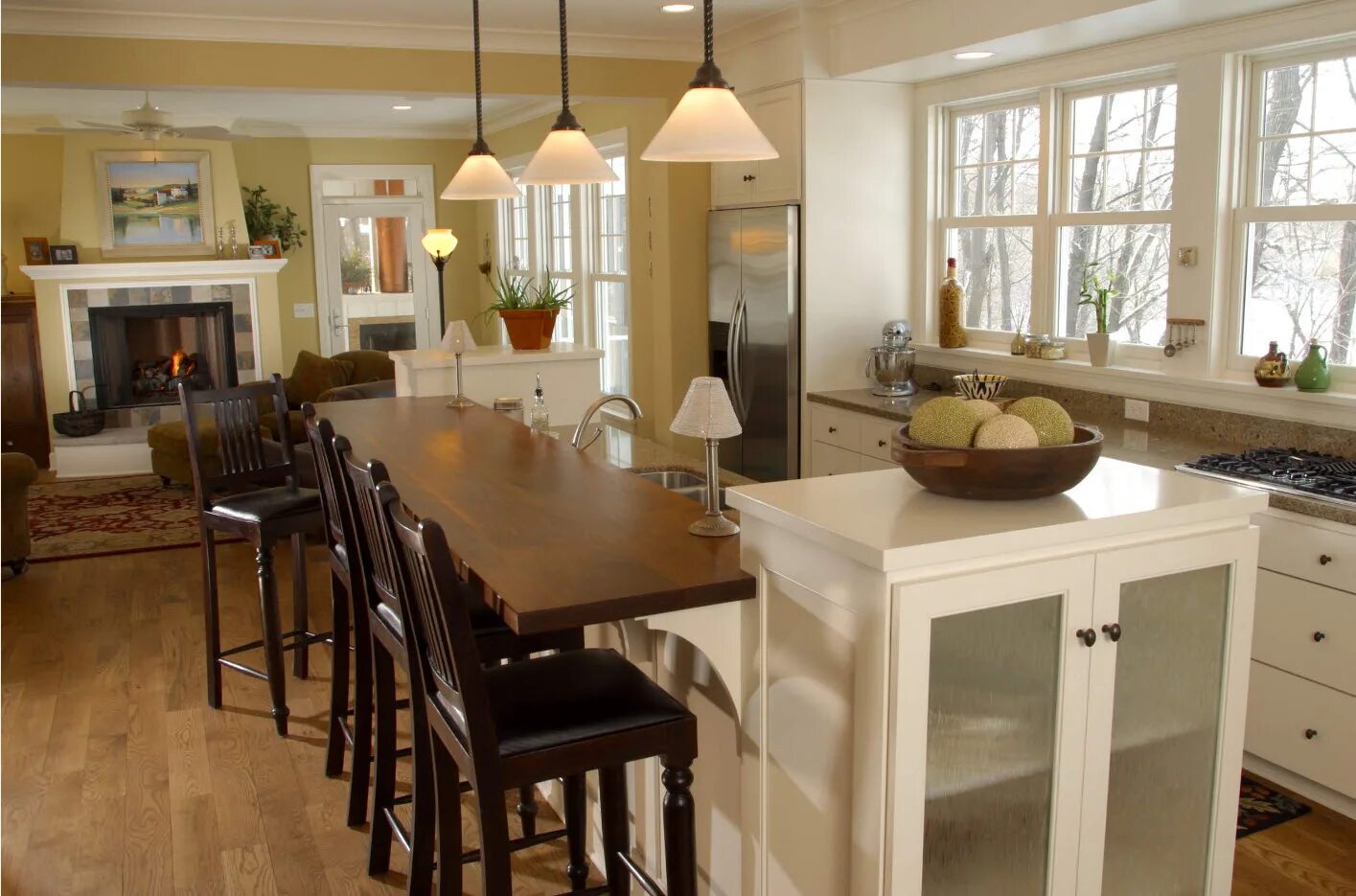 Кухонный остров с обеденной зоной фото Стол остров для кухни с обеденной зоной - фото