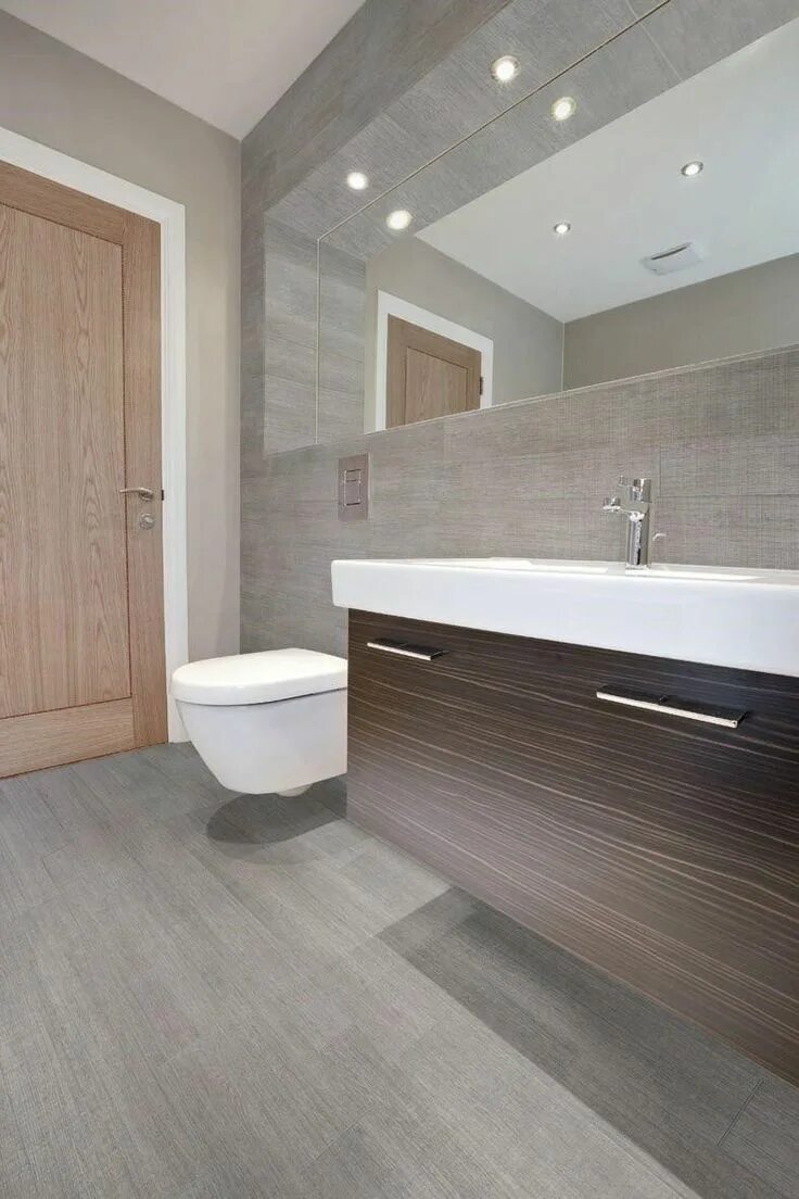 Кварцвинил на стены в ванной фото Lo muebles para baños flotantes son la nueva tendencia Porcelain wood tile bathr