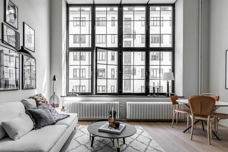 Квартира без штор фото A Small Stockholm Loft with a Cool, Contemporary Vibe - Nordic Design Living roo