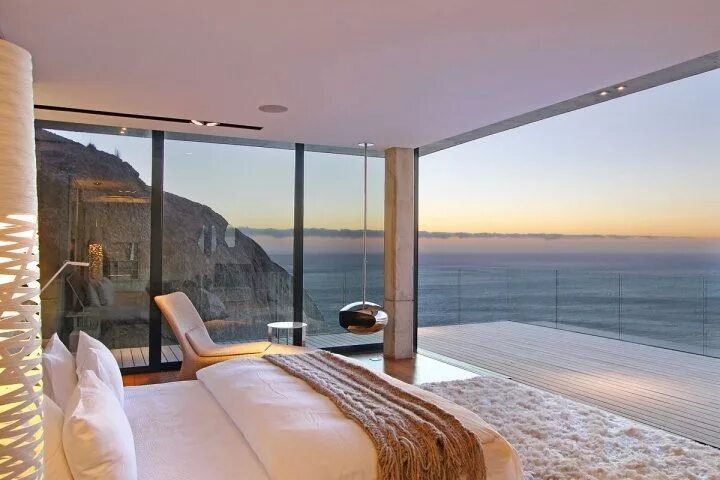 Квартира на берегу моря фото Ocean-front bedroom with a plush rug 10 Modern Bedrooms With An Ocean View Decoi