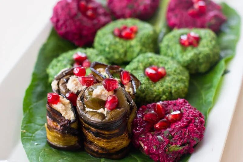 Пхали из баклажан рецепт с фото Rolls of Eggplant with a Filling of Walnuts, Georgian Snack Stock Photo - Image 