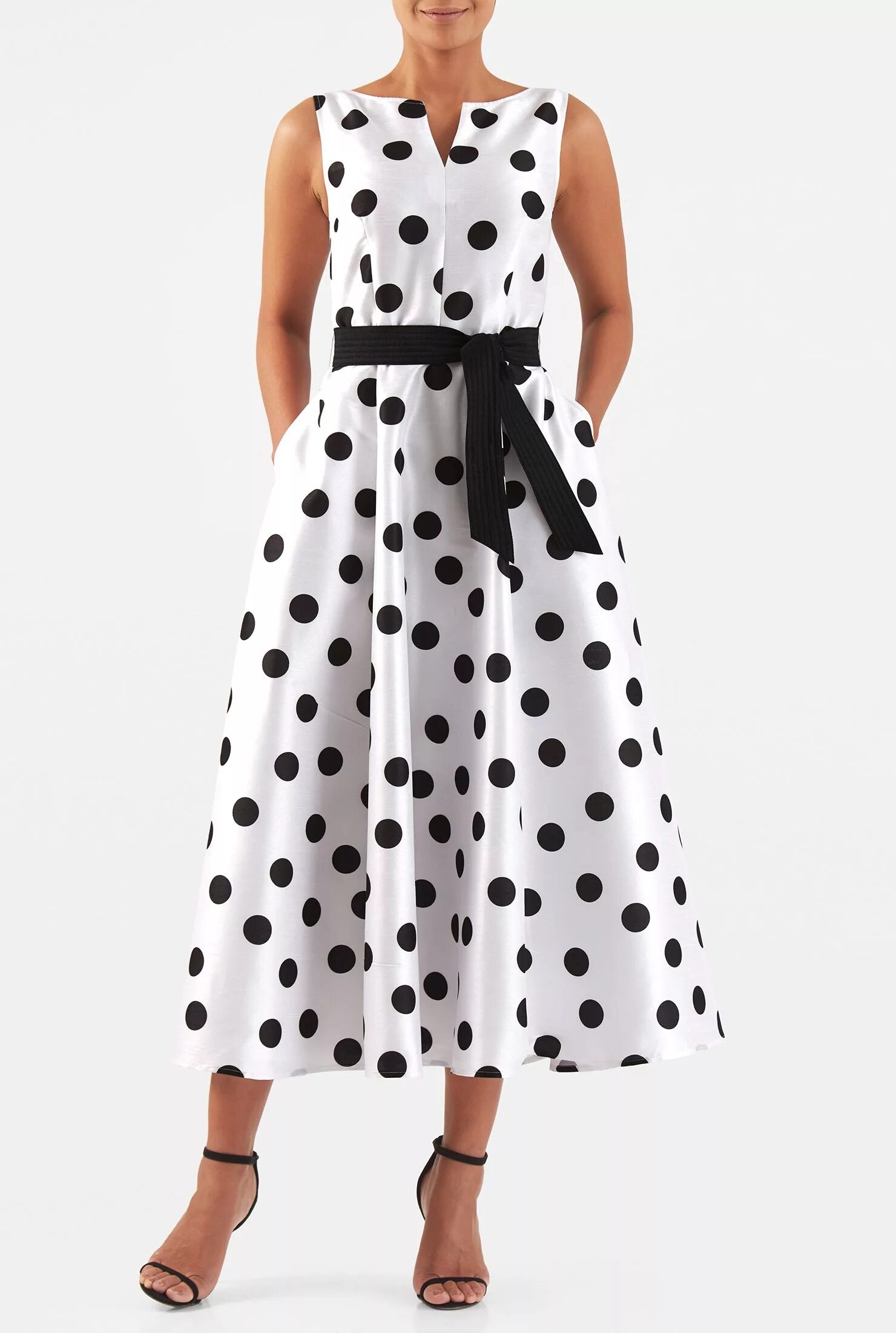 Платья горошек фото A split neck tops our polka dot print polydupioni dress designed with a fitted b