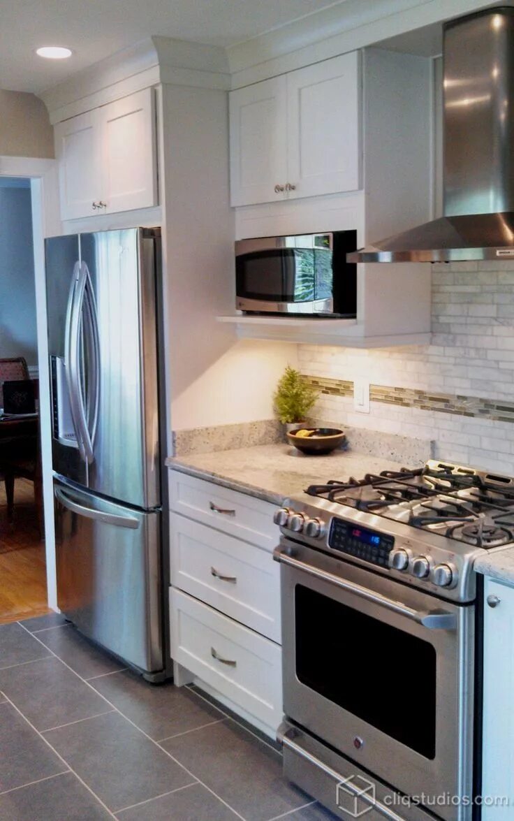 Плита рядом с фото White color doesn't only make the space looks neat, but also elegance at the sam