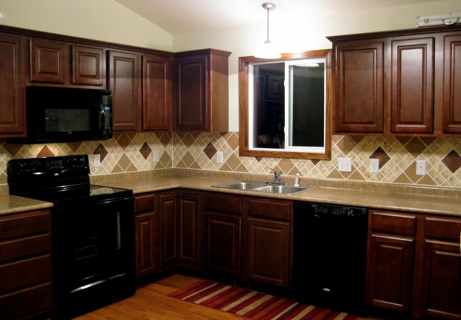 Плитка на кухню коричневая фото Gloria's Backsplash Reality Daydream Backsplash with dark cabinets, Stone kitche