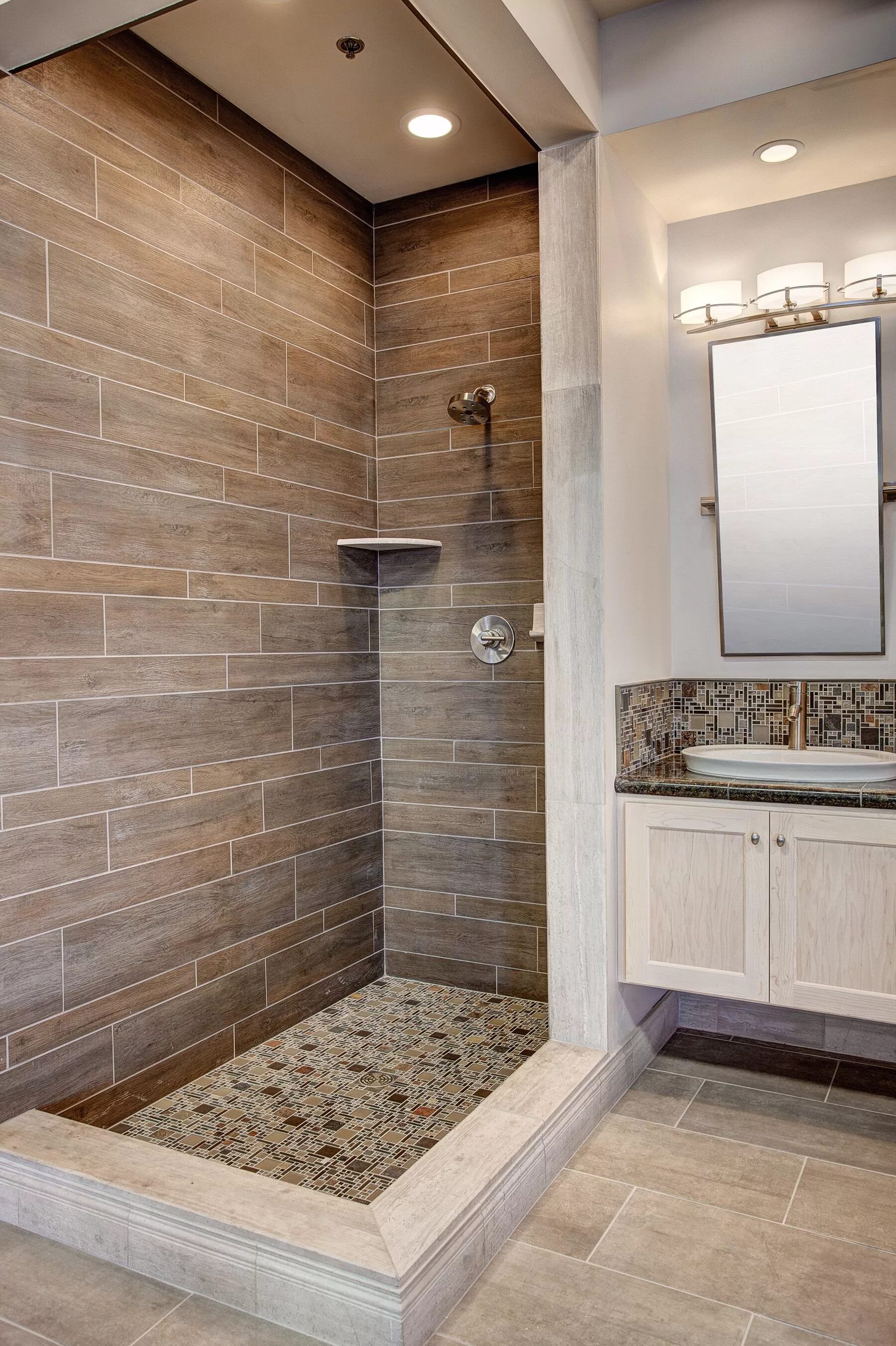 Плитка отделка комнат дизайн A faux wood tile shower featuring Dyrewood Cinnamon Faux wood #thetileshop #wood