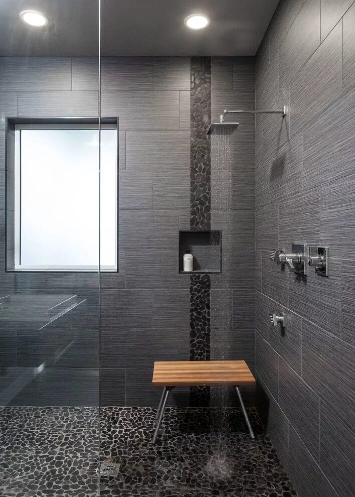 Плитка в душевую комнату фото pebble tiles and small rock tiles in black recessed shelf wooden shower bench gl